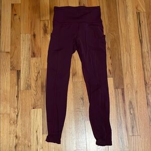 Lululemon Burgundy High-Waisted Leggings with Side Pockets and Adjustable Waist